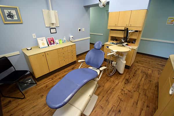 A dental chair in one of our examination rooms